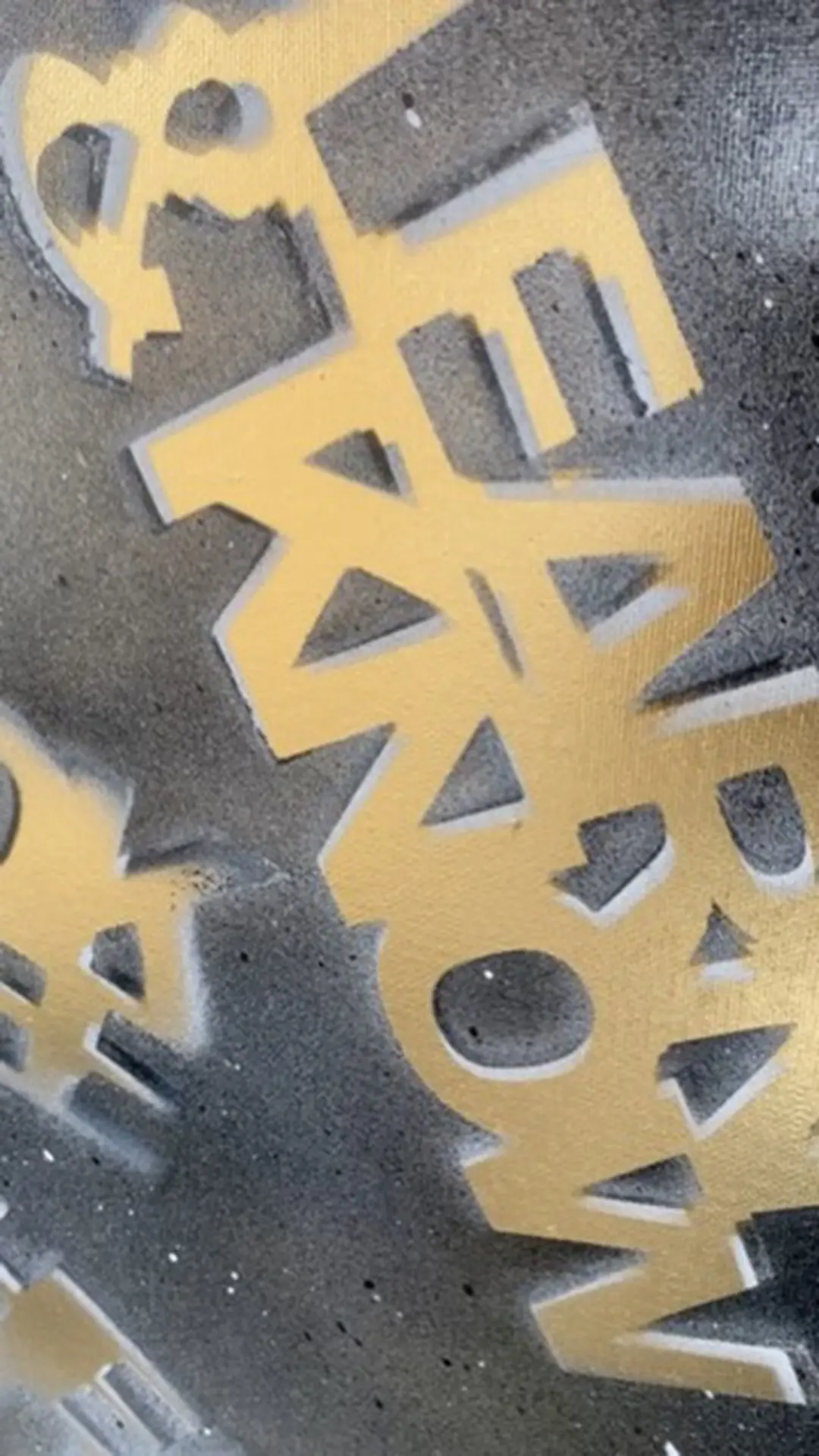 Detail view of layered spray paint textures